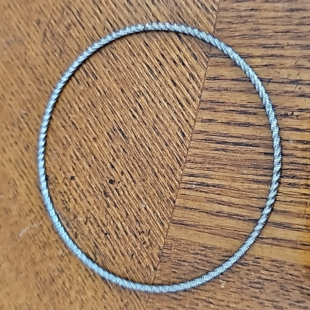 Thin Silver Hoop Bracelet